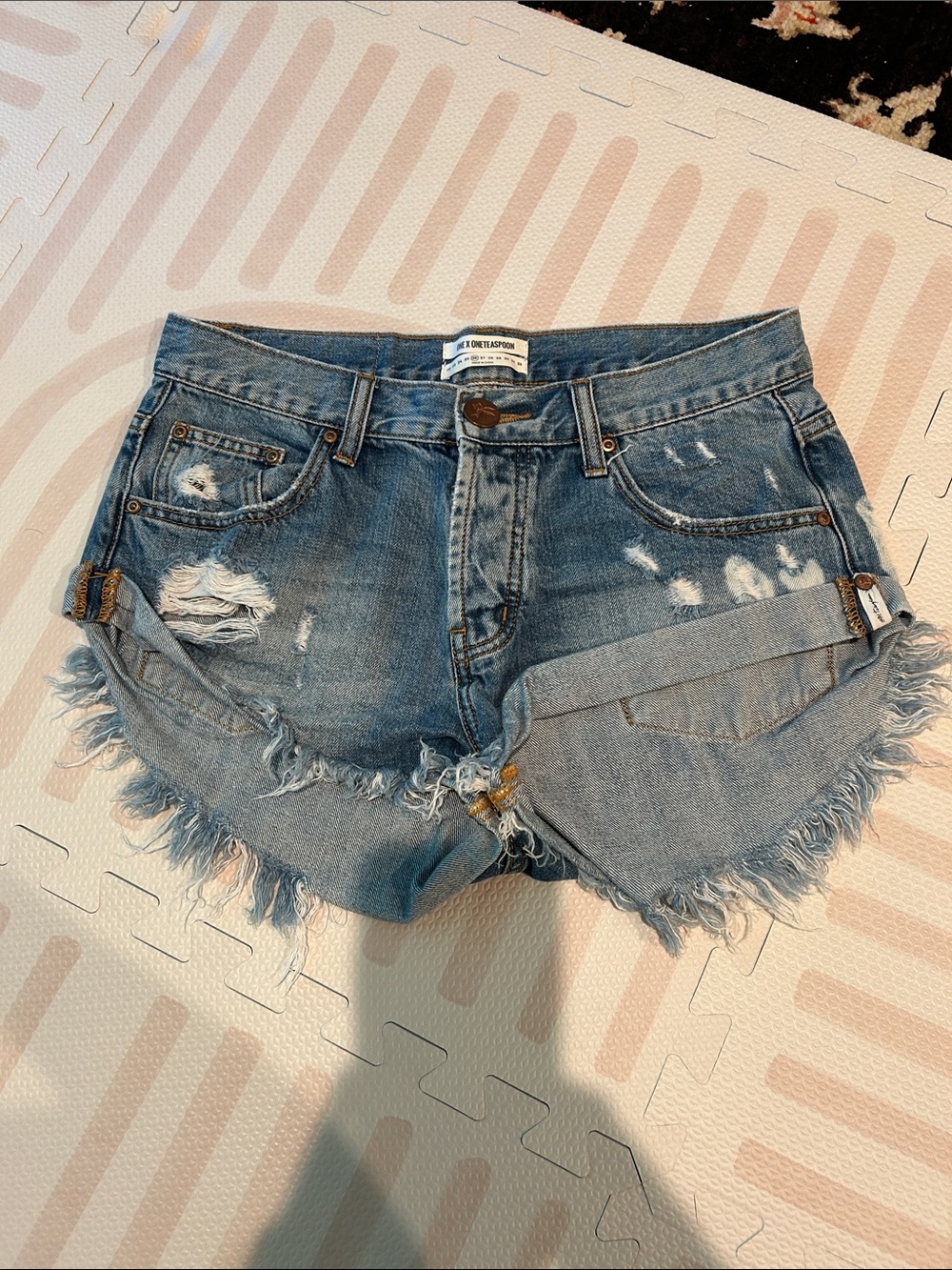 Distressed High-Waist Denim Cutoff Shorts — Light Blue